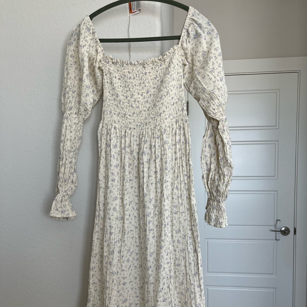 Nothing Fits But Super cute maternity dress. So comfy and cute.